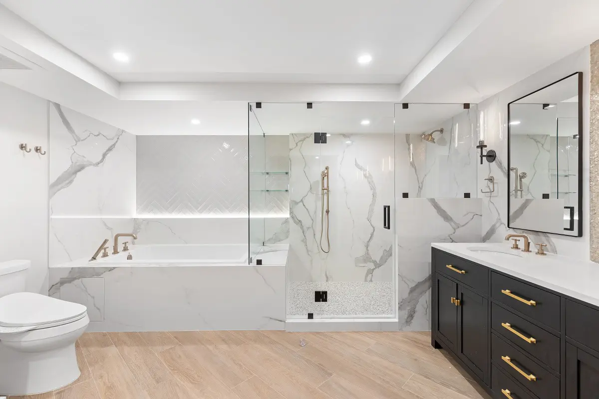 A beautiful white color bathroom with a mirror